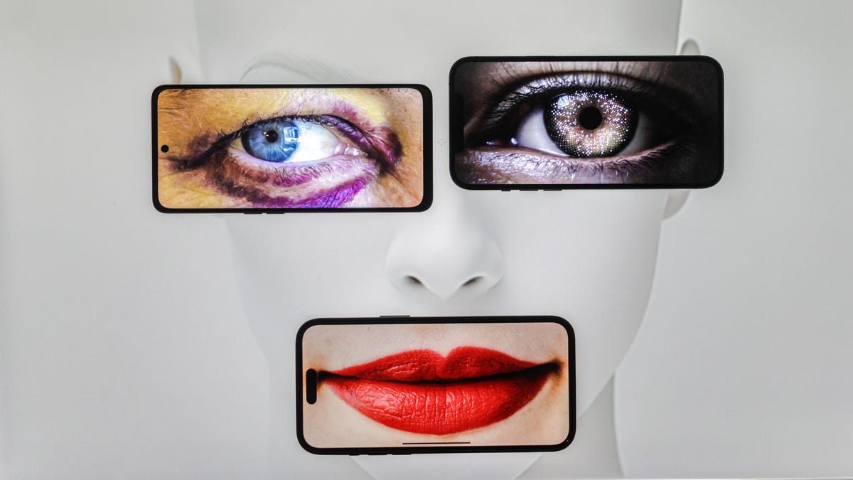 Vivid images of two different eyes and a mouth superimposed on a mannequin's face
