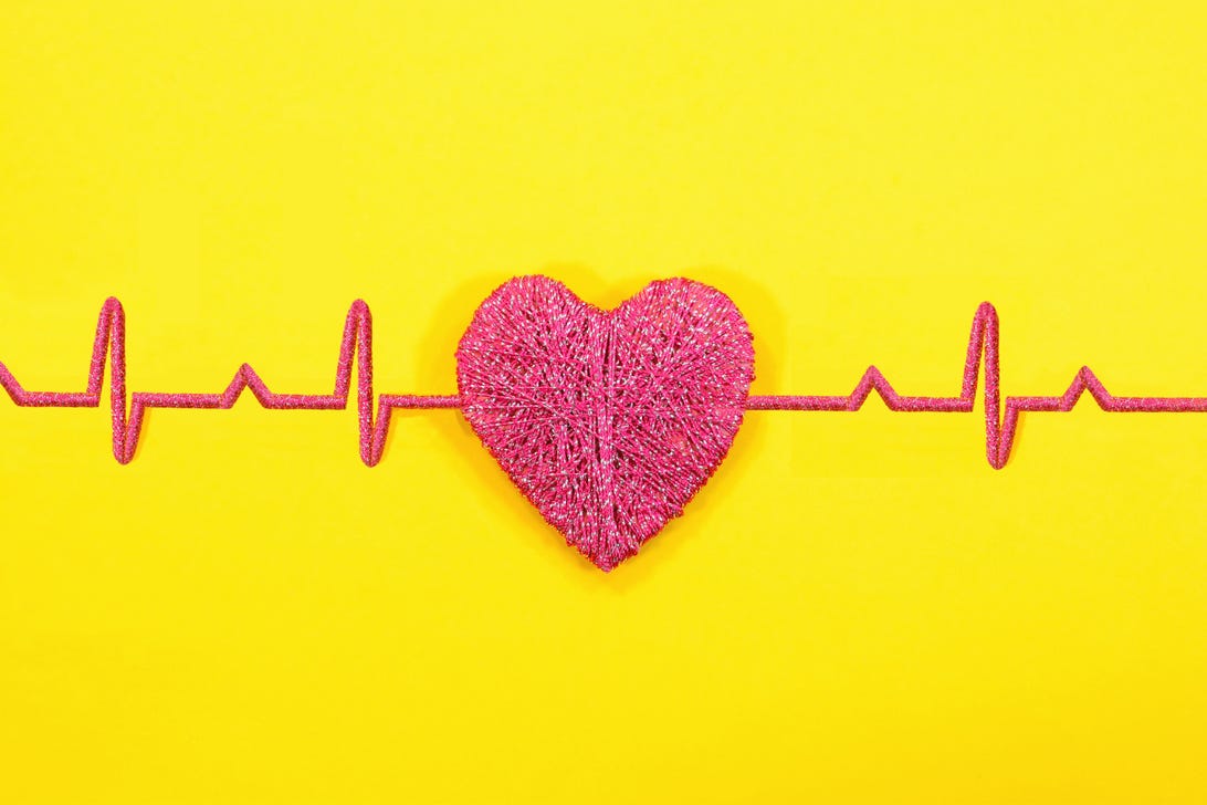 an EKG line with a stylized heart on it