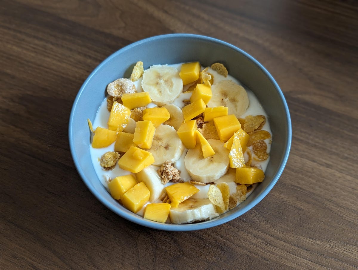 breakfast yogurt bowl with fruit and granola