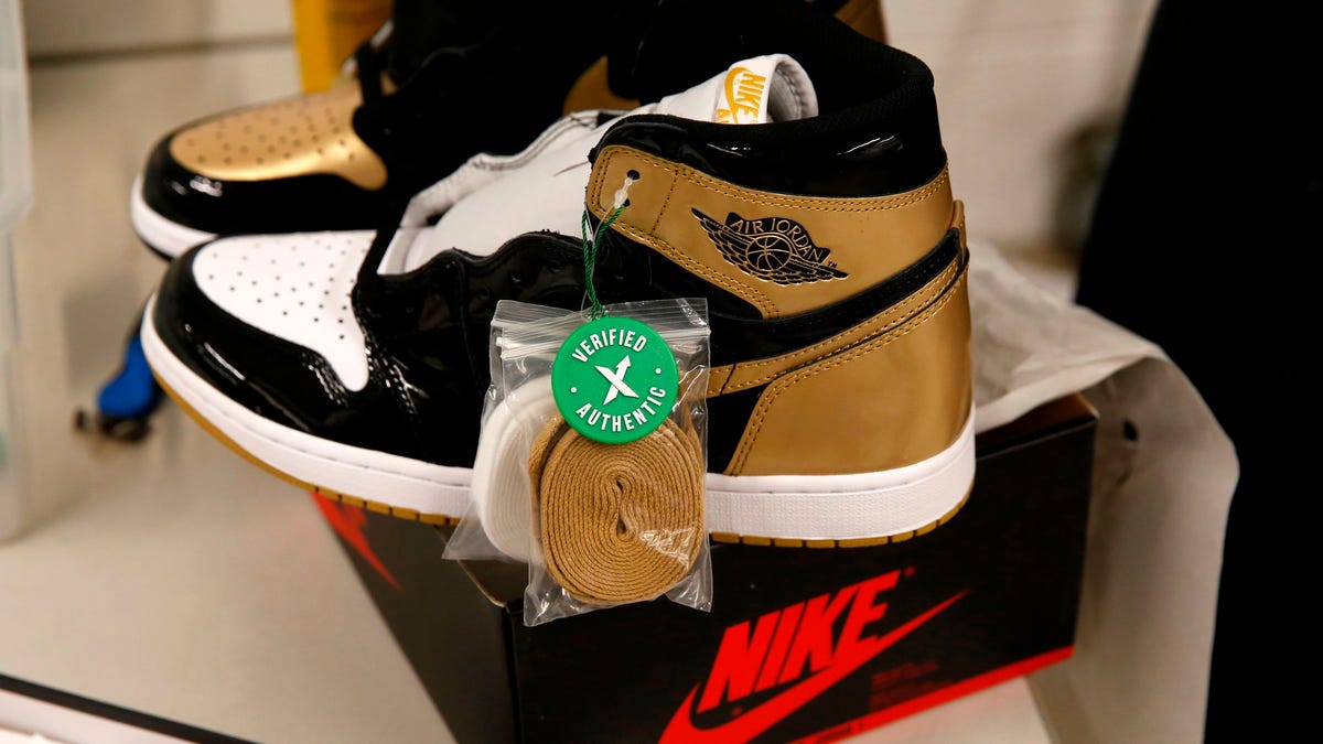 A pair of Air Jordan 1 Retro shoes are seen before being packed to ship out of Stock X