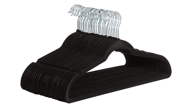 A stack of black clothes hangers