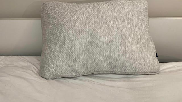 Helix pillow on a white bed