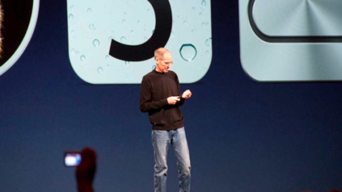 Steve Jobs takes the stage at WWDC 2011.