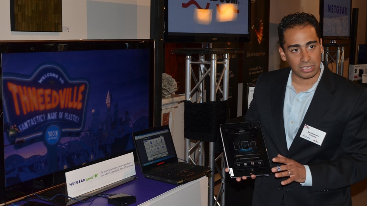 David Henry of Netgear shows off how the Netgear Genie works with media streaming.
