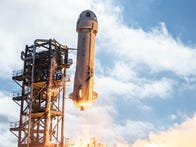 <p>Blue Origin founder Jeff Bezos, famous for his Amazon-fueled billions, inspected a booster on the landing pad after a successful test flight. The New Shepard boosters are reusable.</p>