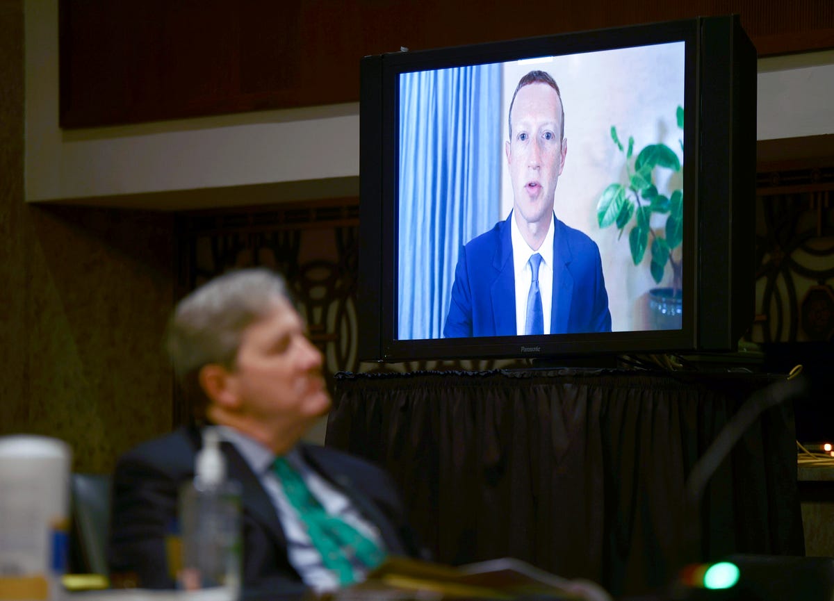 Facebook CEO Mark Zuckerberg testifies remotely as Senator John Kennedy listens