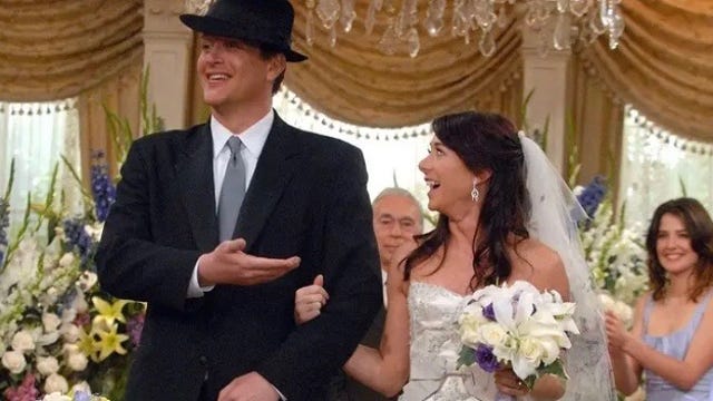 Marshall and Lily as a newly married couple on How I Met Your Mother