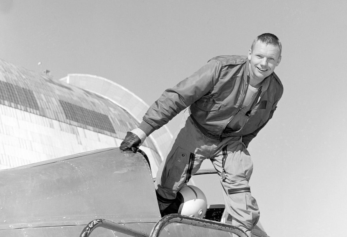 Neil Armstrong climbs out of the cockpit of an X-14