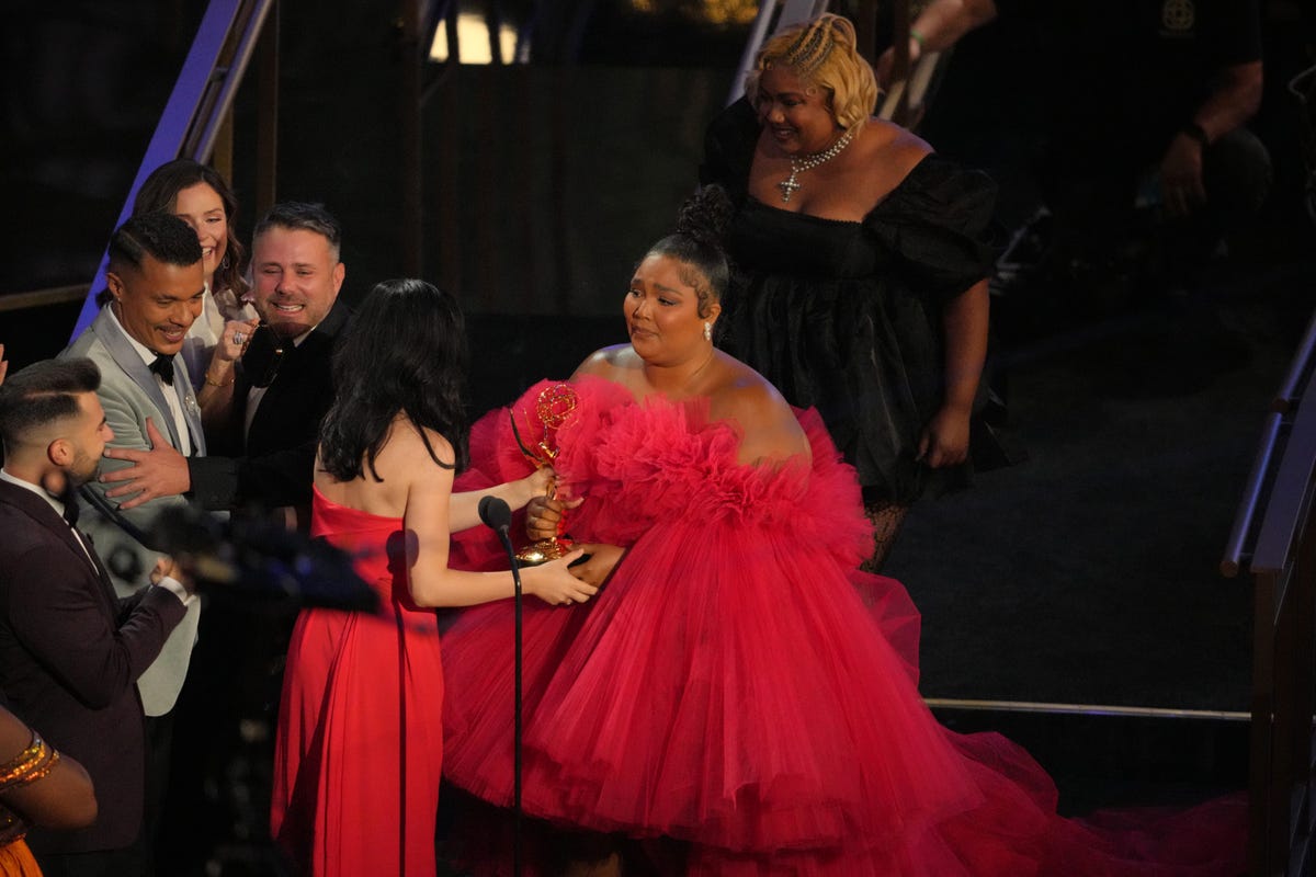 Lizzo (C) and and cast and crew of 'Lizzo's Watch Out for the Big Grrrls' accept the Outstanding Competition Program award onstage during the 74th Primetime Emmys at Microsoft Theater on September 12, 2022 in Los Angeles, California.