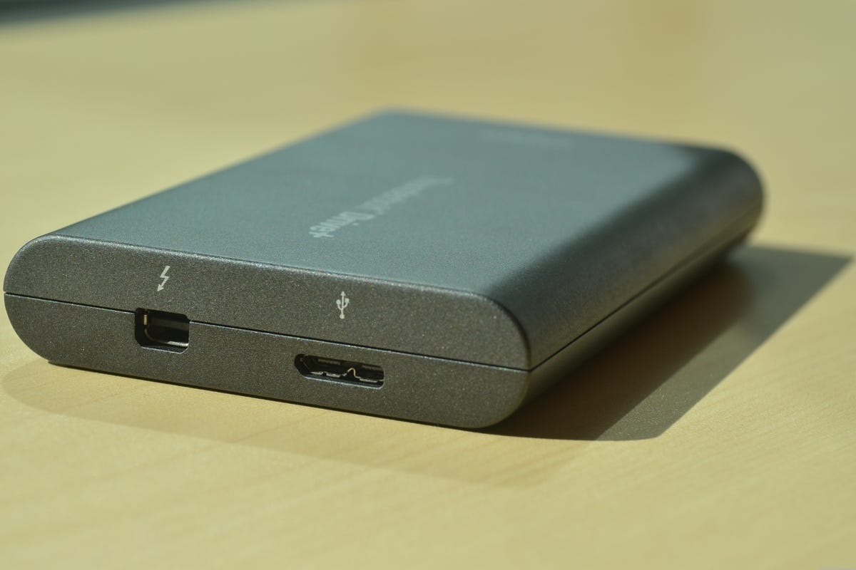 The bus-powered portable drive now can work with either Thunderbolt or USB 3.0 (USB 2.0 compatible).