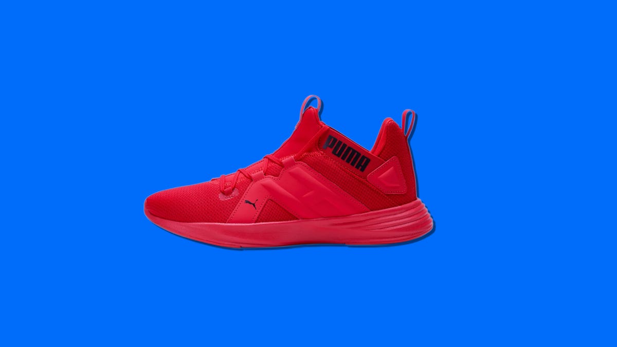 A pair of red shoes on a blue background