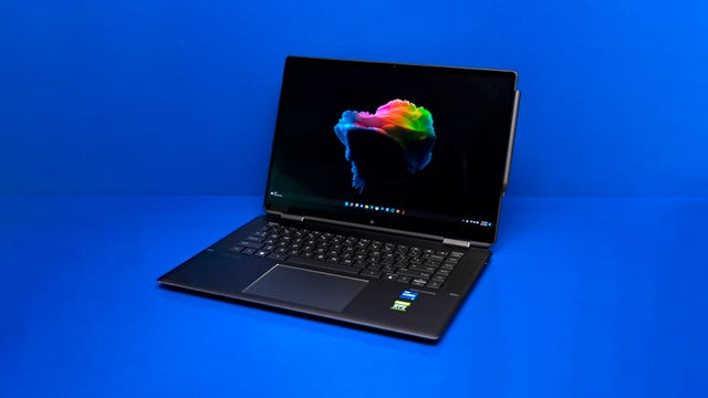 HP Spectre x360 16 on a blue background
