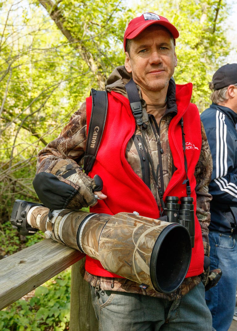 Keith Barnes, a South African living in Taiwan, carries a massive 500mm Canon supertelephoto lens and Leica Ultravid binoculars. The birding expert works for Tropical Birding, which runs 120 bird tours a year for avian enthusiasts.