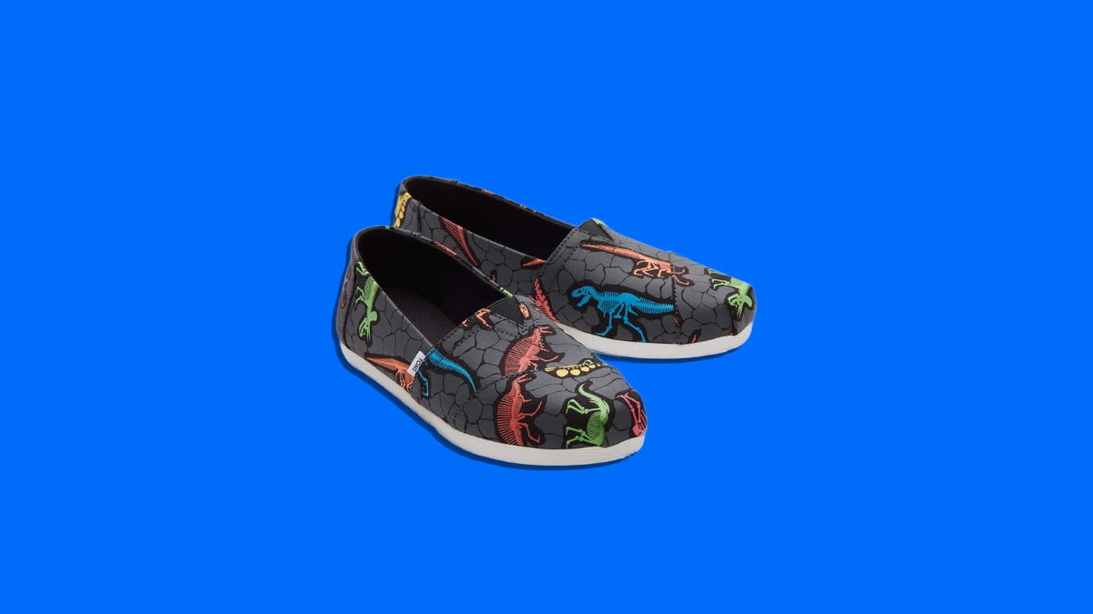 Close up for women's glow in the dark dino shoes