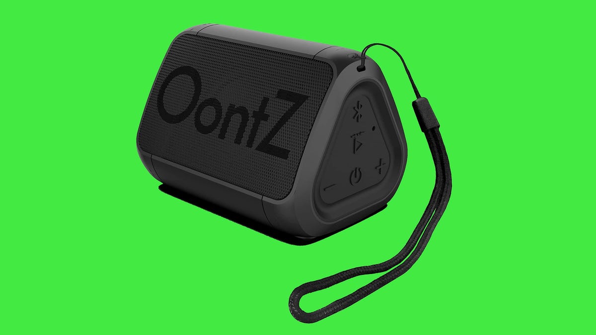 A black Oontz Bluetooth speaker against a bright green background.