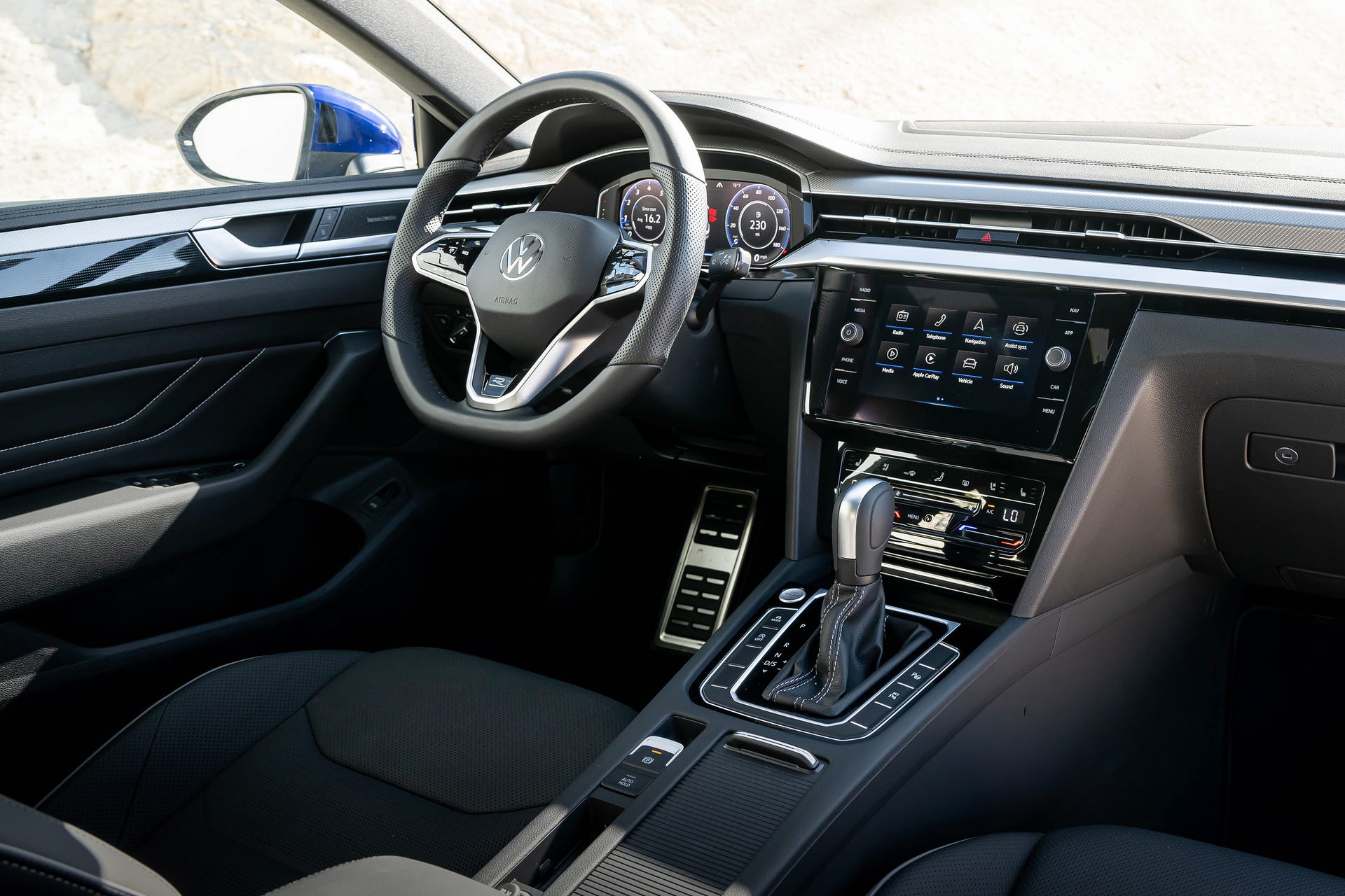 2022 Volkswagen Arteon driver's controls and steering wheel.