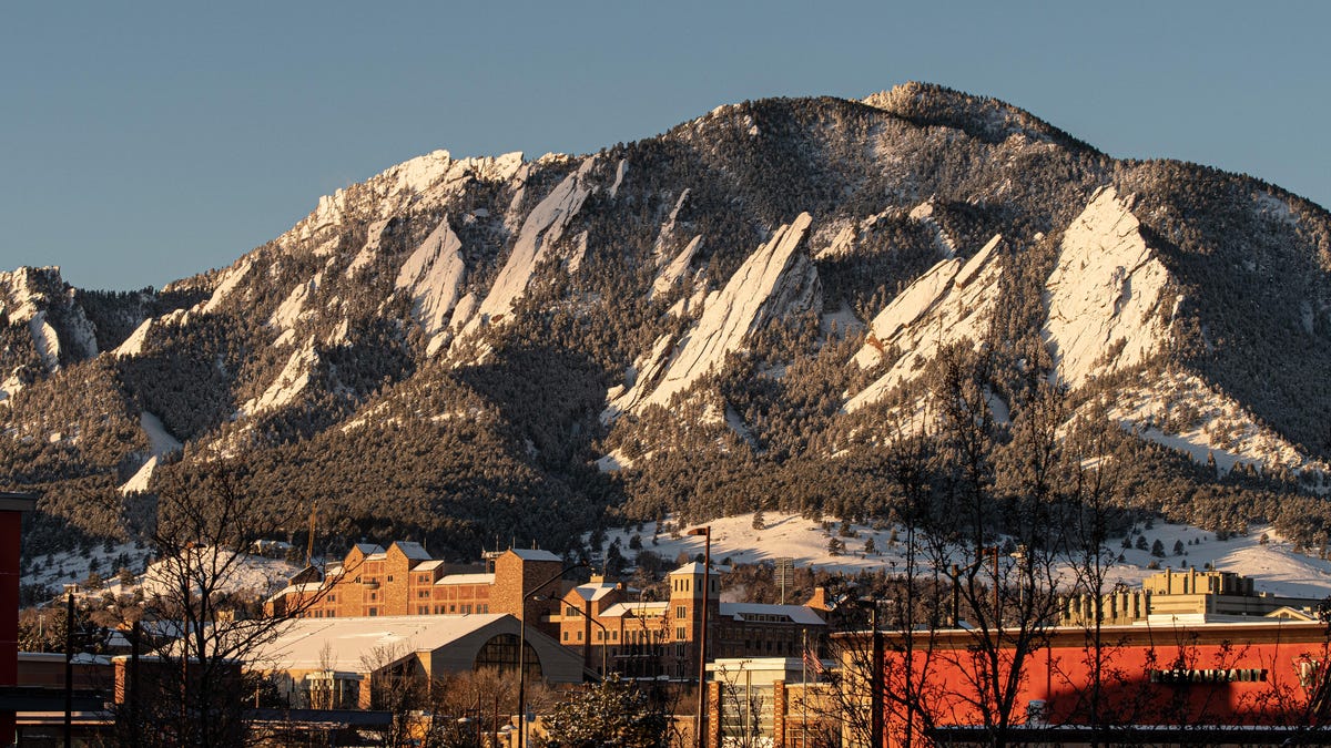 Mountains behind buildings in Boulder, Colorado.