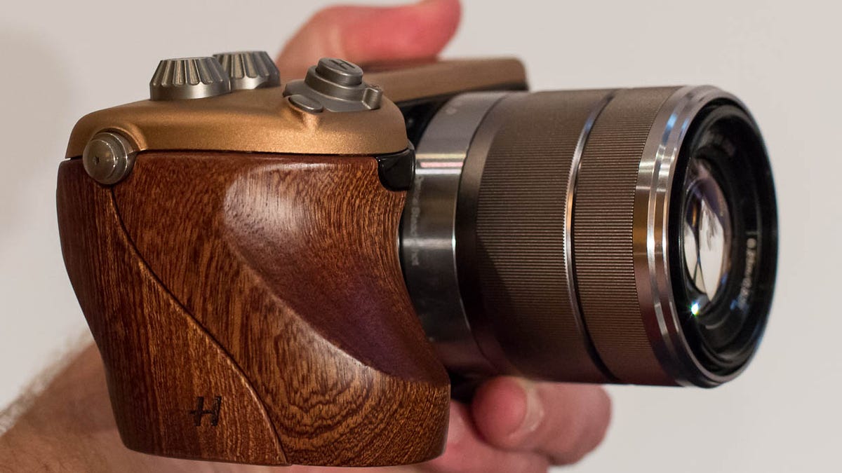 This Hasselblad Lunar prototype brings a sculpted wooden grip and jewel-bedecked controls to a Sony NEX-7 camera design.