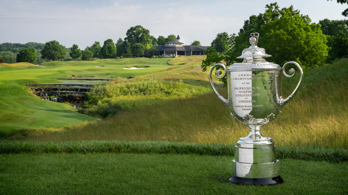An image of the Wanamaker trophy with the Valhalla Golf Club in the foreground.