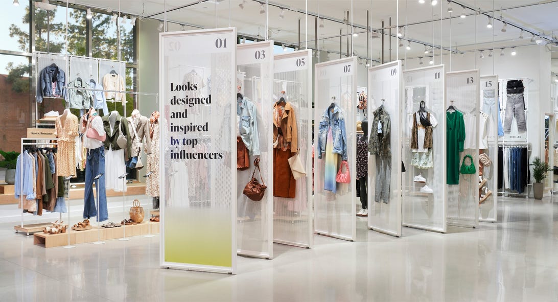 Curated outfits on display at Amazon Style retail store