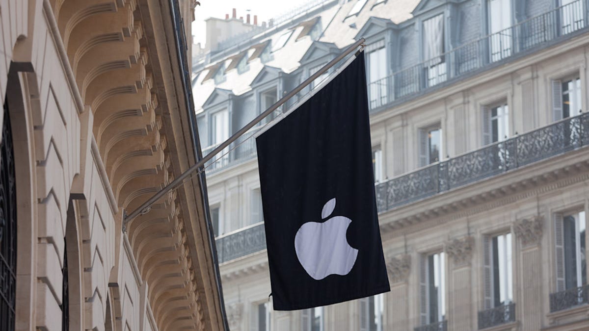 The Apple store in Paris sports the company logo on a flag.
