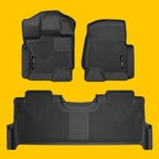 Husky Liners X-act Contour Floor Liners on a yellow background