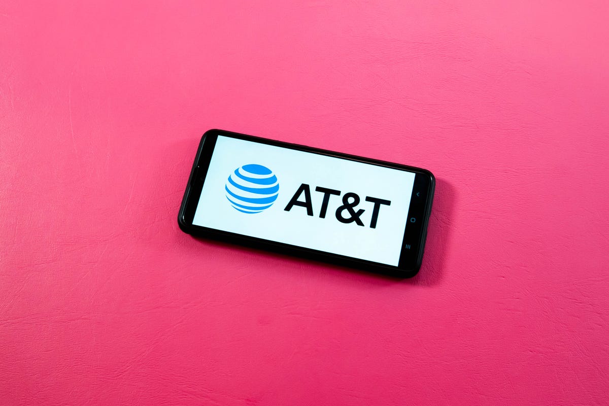 A phone showing the AT&T logo on its screen