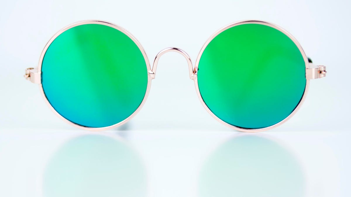 Clear sunglasses with bright green tint.