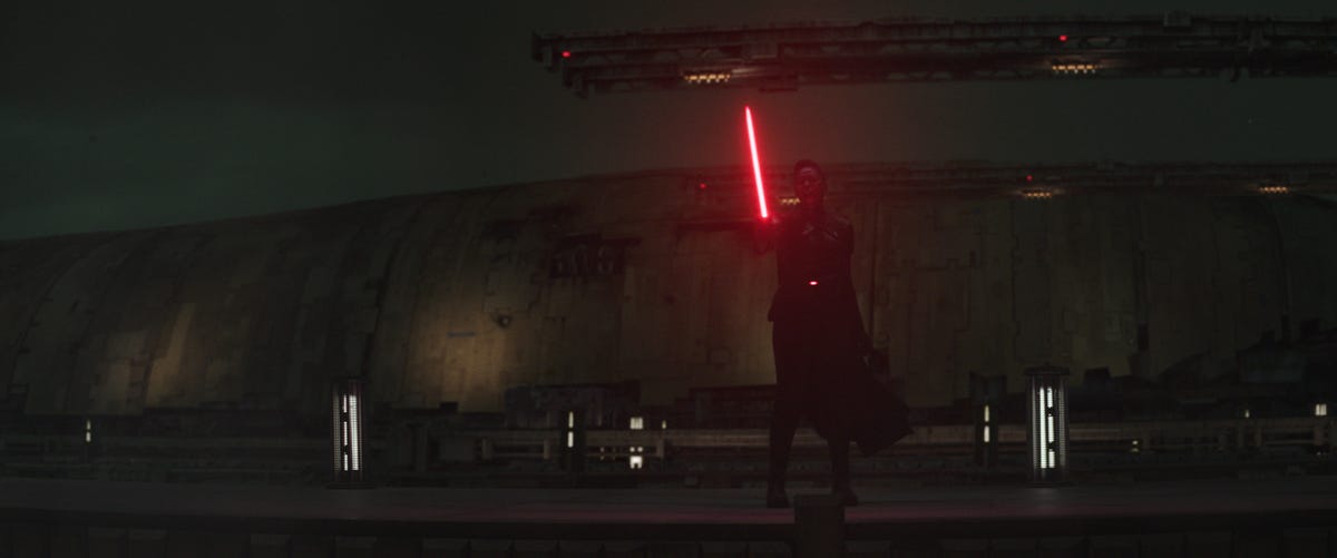 New villain Reva, approaching with a red lightsaber