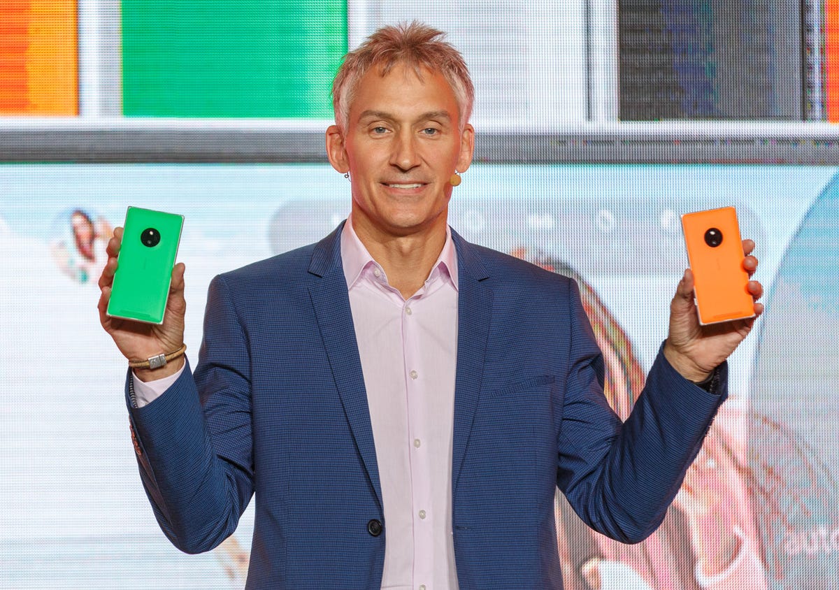 Chris Weber, Microsoft's corporate vice president of mobile devices sales, shows off the Nokia Lumia 830 during the IFA trade show.