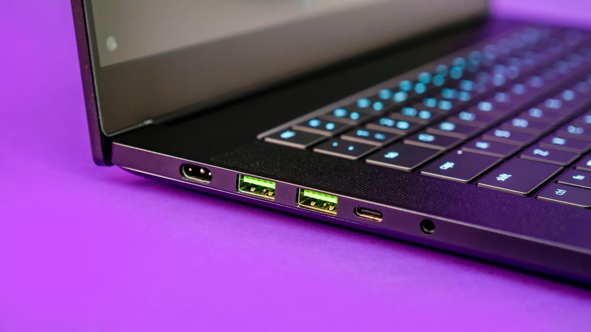 Razer Blade 15 2022 laptop computer on a purple background