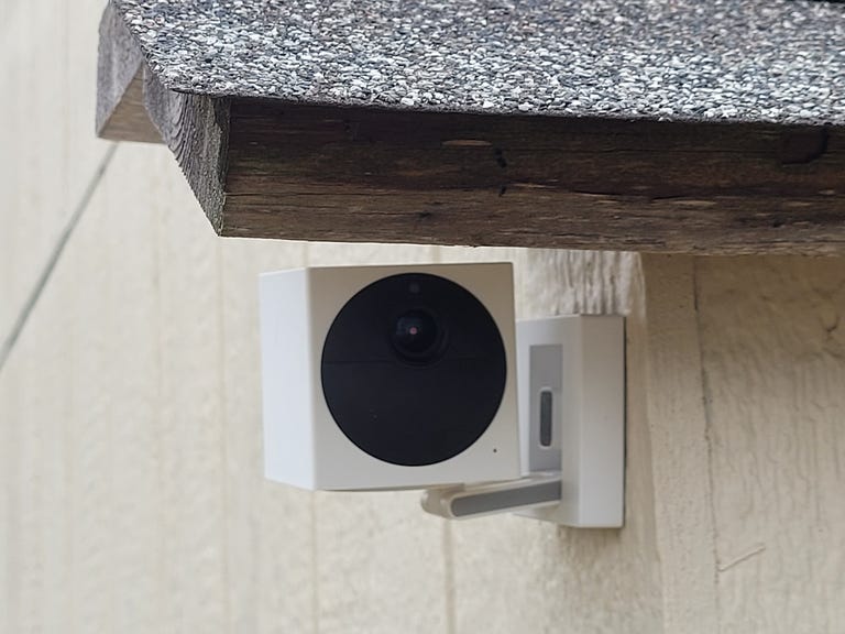 A mounted Wyze outdoor camera.