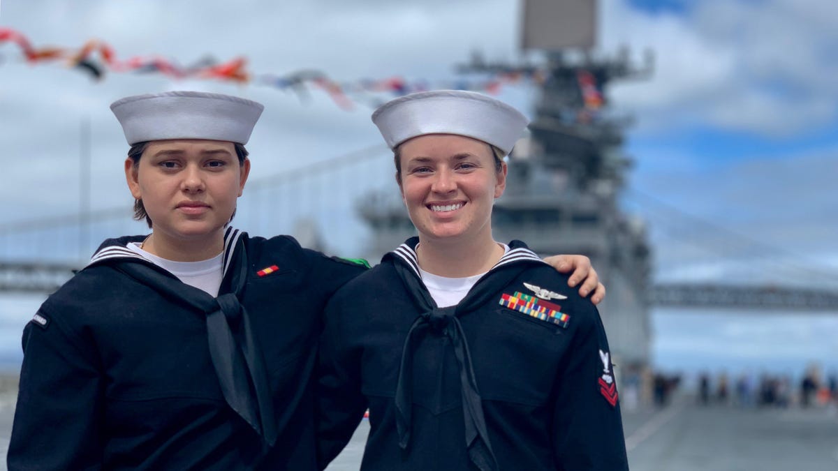 A photo of two sailors using the iPhone XS Max's Portrait Mode and Studio Light effect.