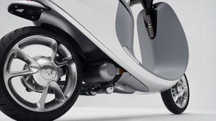 4-quarter-view-back-gogoro-smartscooter-quarter-view-from-back-right-ground-view-on-white.jpg