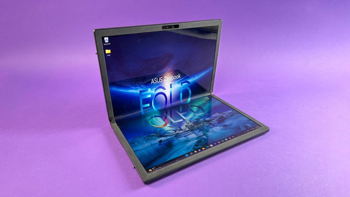 Asus Zenbook Fold OLED on a purple background