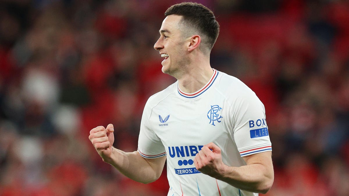 Tom Lawrence of Rangers celebrating, looking to right ,with both hands clinched in a fist
