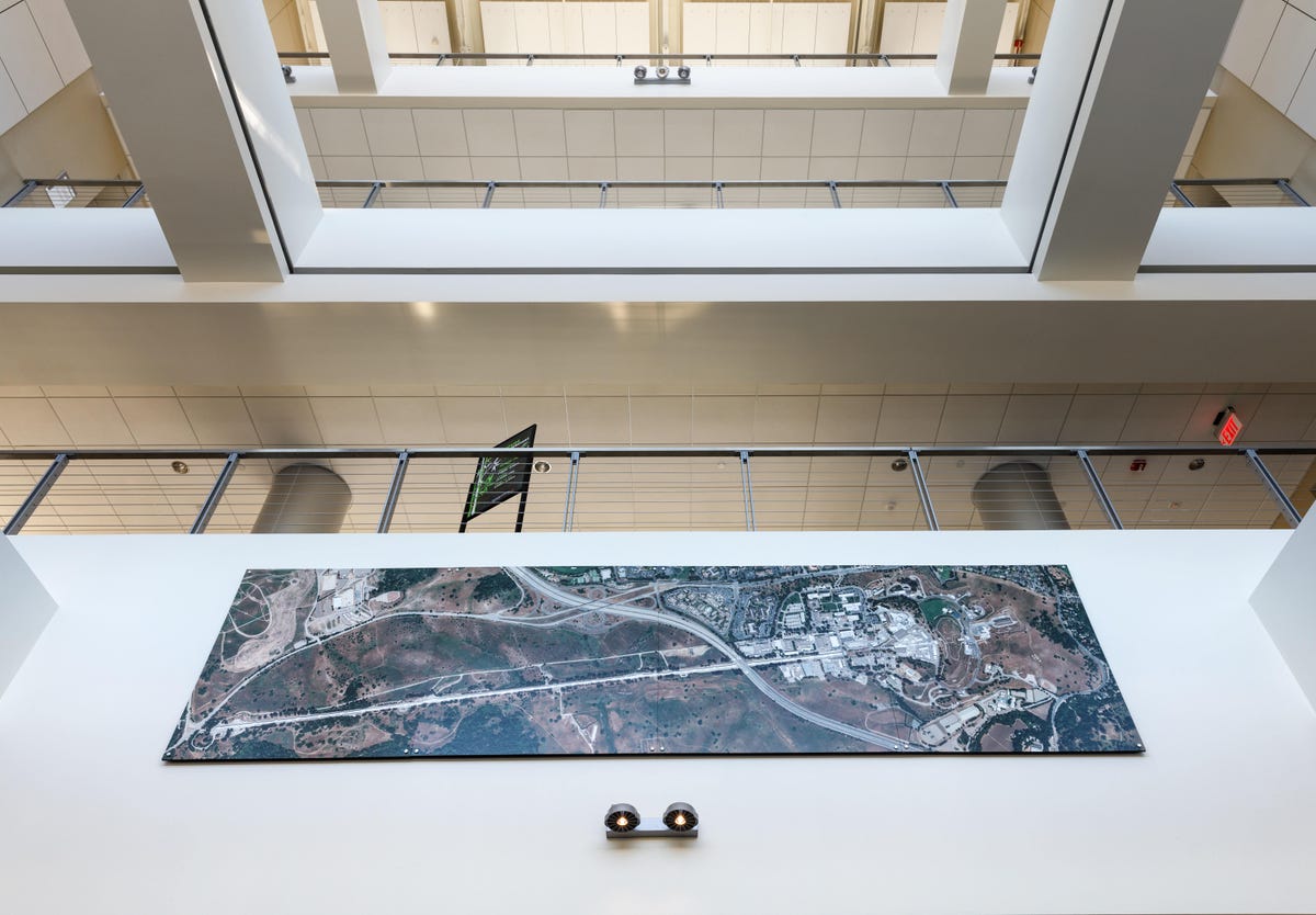 Visitors to SLAC are greeted with a large aerial photo showing the accelerator stretching in a straight line west of Stanford University and underneath Interstate 280.