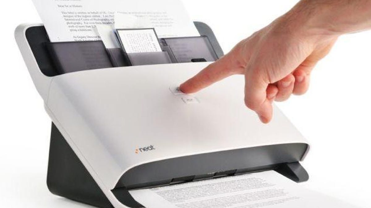 The NeatDesk scans documents, receipts, and business cards in a flash.
