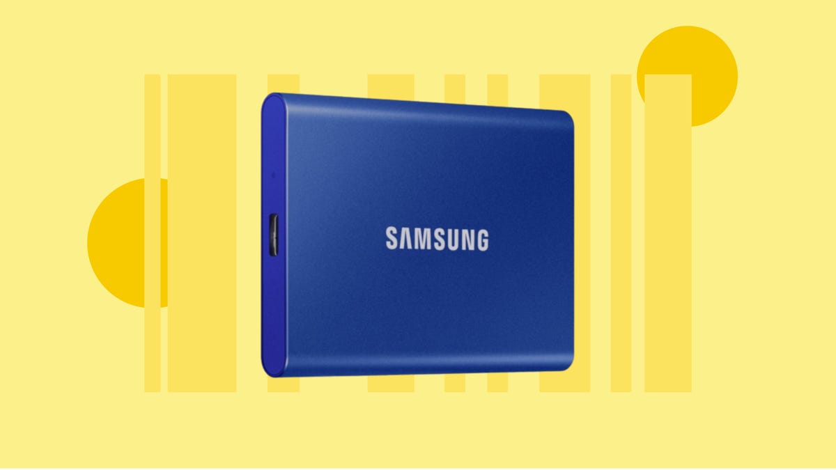 The blue variant of Samsung&apos;s T7 2TB portable external SSD is displayed against a yellow background.
