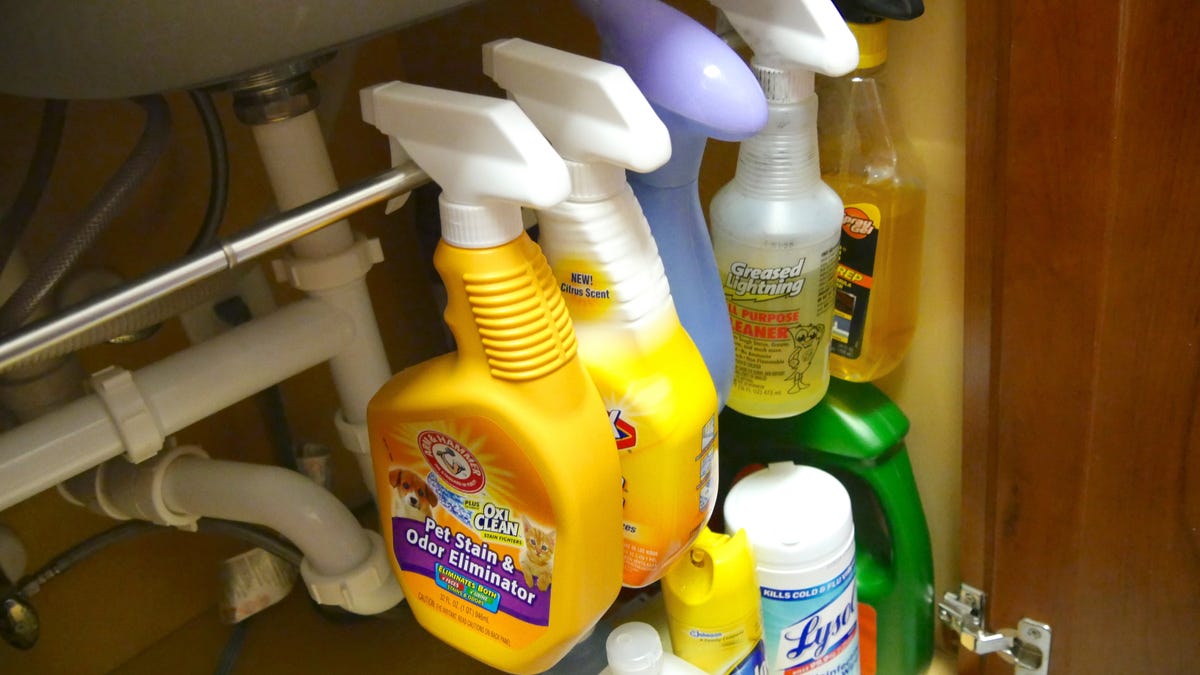 Use a tension rod to increase storage space under the sink - CNET