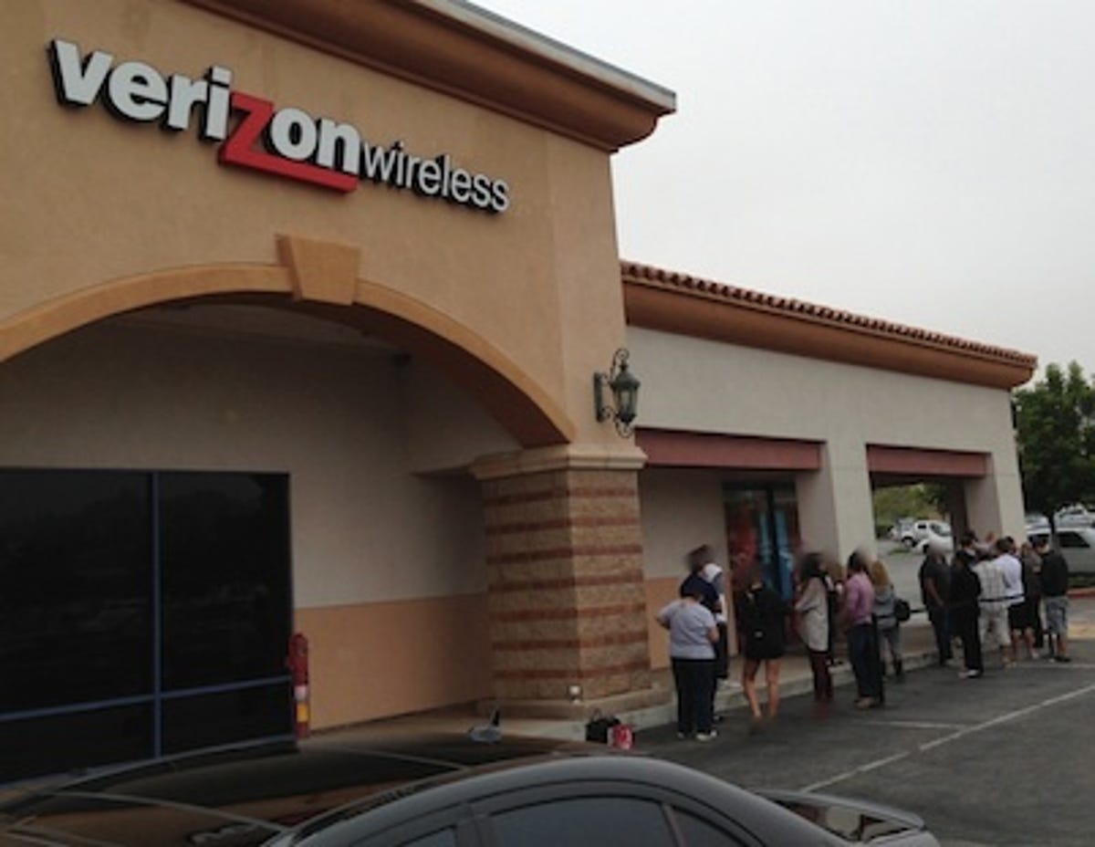 There was a small line for the 5S/5C at my local Verizon store in Los Angeles.  But the wait time was hours.