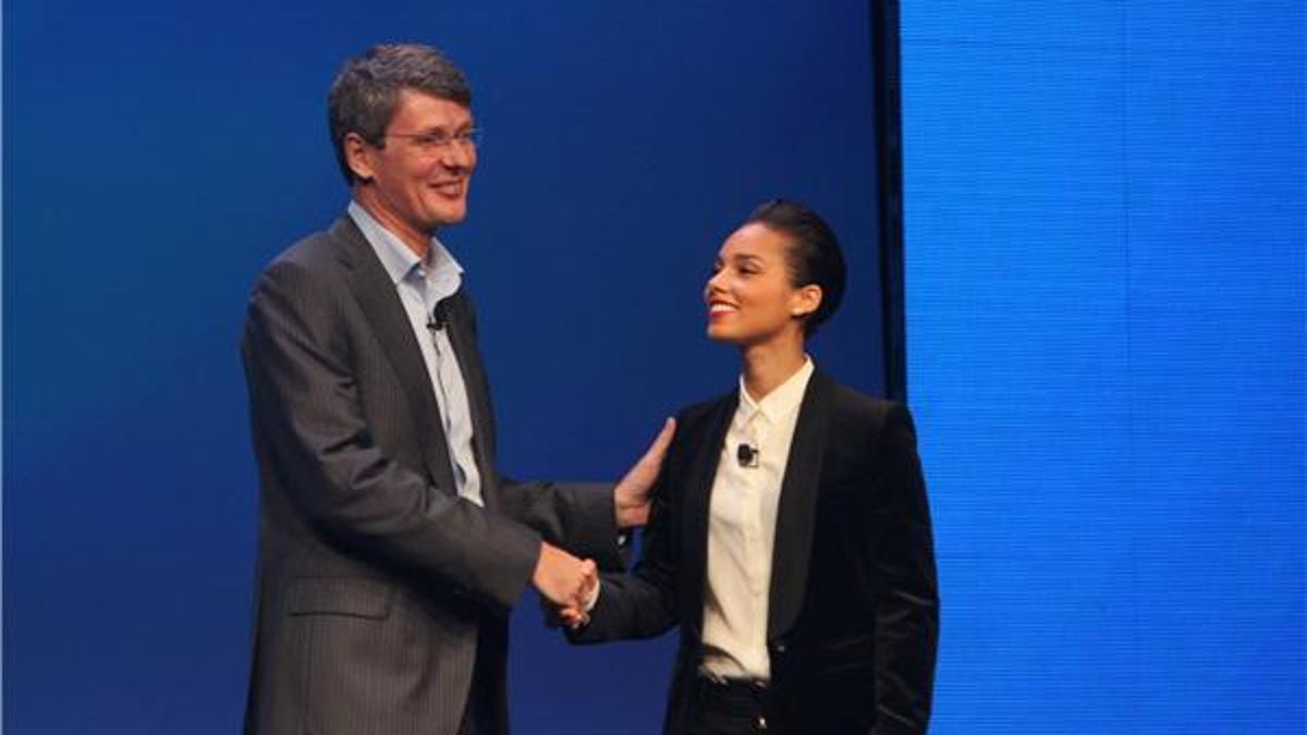 BlackBerry CEO Thorsten Heins greets Alicia Keys as the company's new global creative director today.