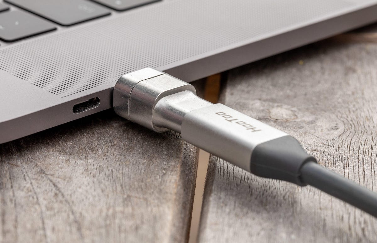 The Innerexile ThunderMag magnetic connector is considerably thicker than the side of this MacBook Pro.