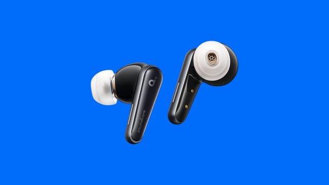 Anker Liberty 4 black earbuds with white tips against a blue background