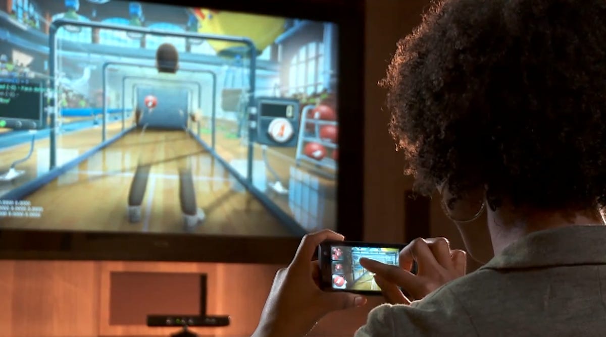 Squaring off against Kinect opponents with your Windows Phone 7 device, from the couch.