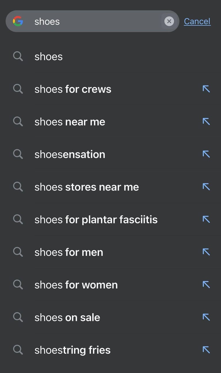 A search for 'shoes' in Chrome showing 10 suggestions