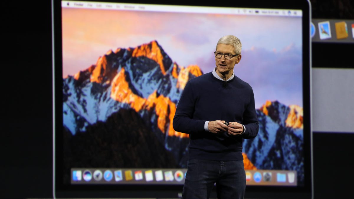 Tim Cook stands onstage at Apple&apos;s annual developer conference in 2017. On Wednesday, the company patched the Sierra and El Capitan operating systems against the Meltdown security flaw.