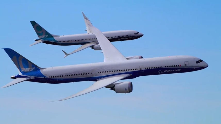 Watch two Boeing jetliners perform synchronized flying