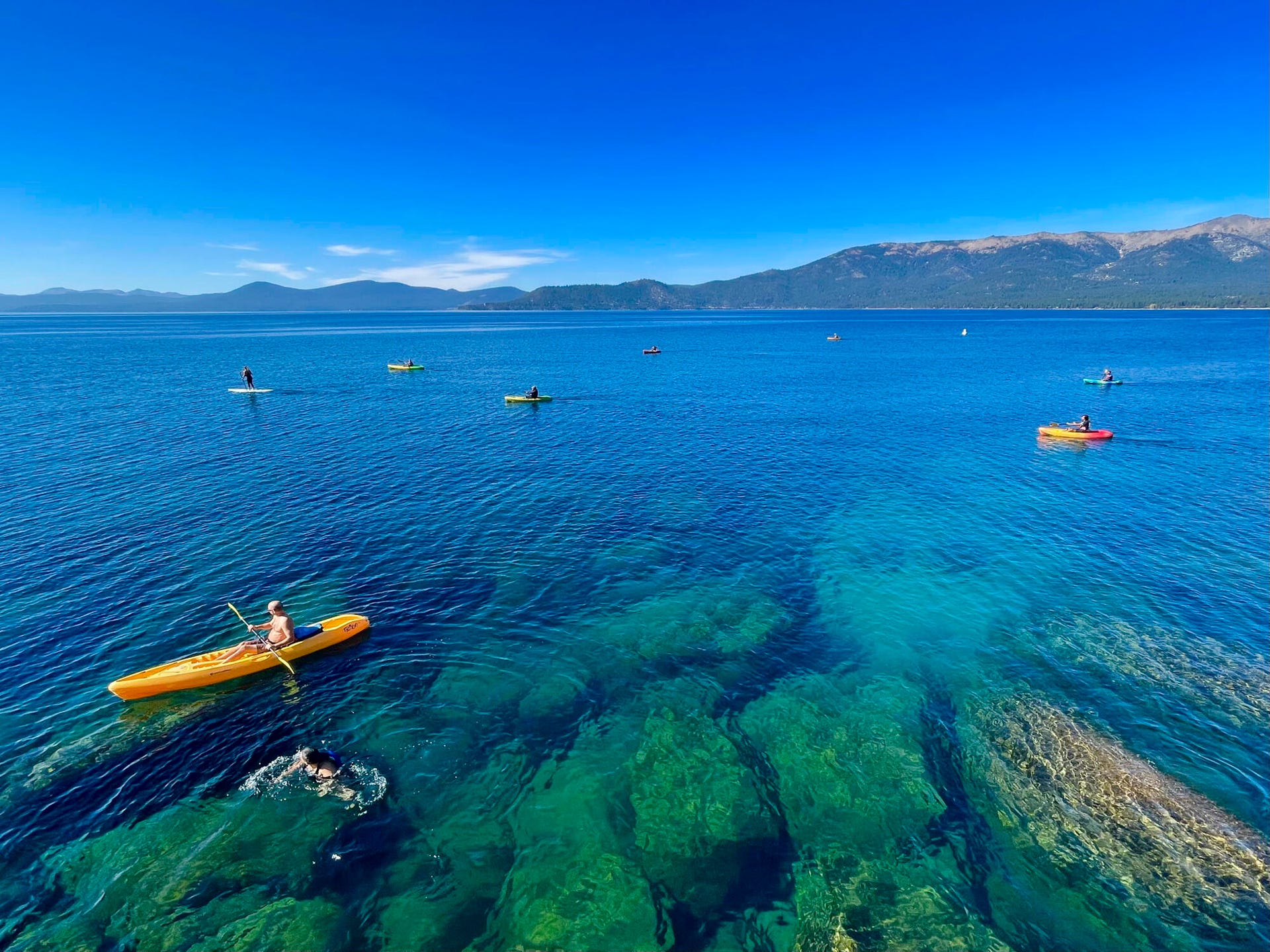 Kayaking Lake Tahoe's crystal clear blue waters off Sand Harbor.