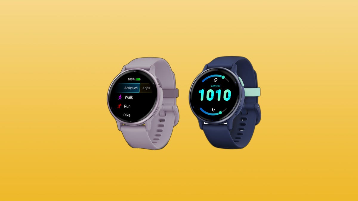 Two of the same smartwatch in different color combinations: one a rose cold case with off-white watchband, the other with a silver case and dark blue watchband.